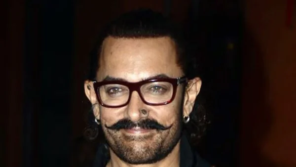 Aamir Khan and Junaid Shine at Wankhede in MI Jerseys During IPL 2026 Clash