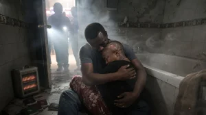 African Couple's Final Embrace in Delhi Hotel Fire