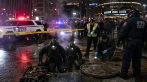 Trio Emerges from Manhole Near Penn Station